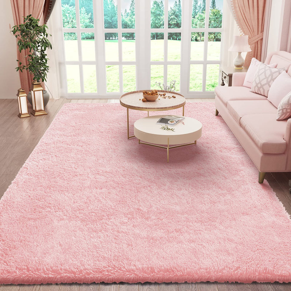 Ophanie pink area rug in bedroom view showing warm texture and inviting softness