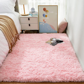 Ophanie Pink Rug in nursery provides warm texture for tummy time and reading.