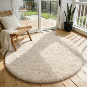 Ophanie round rug ivory circle; ultra-soft surface for cozy living spaces.
