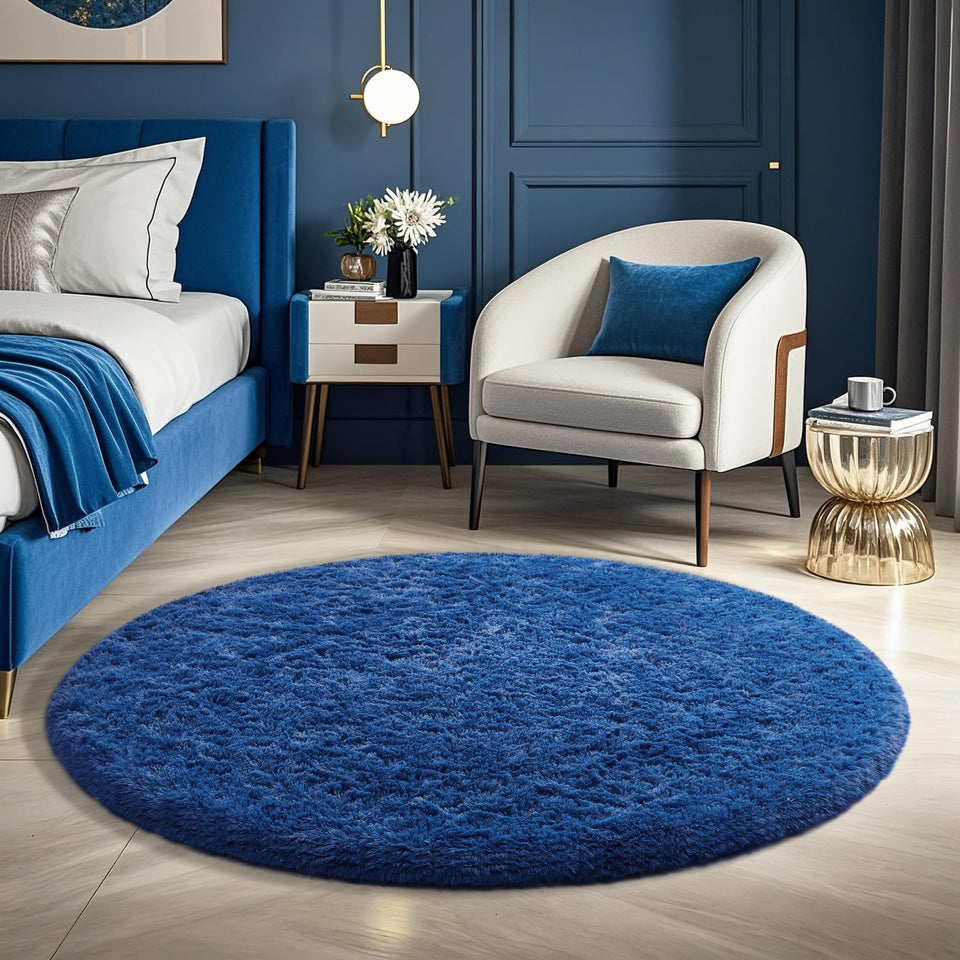 Ophanie round rug 4ft blue circle — full view in a cozy living room, soft underfoot.