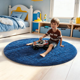 Ophanie blue circle rug in a kid's playroom, ideal for safe tummy time.