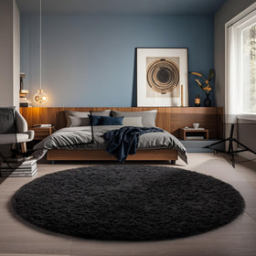 Ophanie Round Rug 5ft Black Circle closeup highlights ultra-soft pile for barefoot comfort.