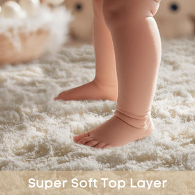 Ophanie fluffy shaggy cream rug for luxurious comfort.