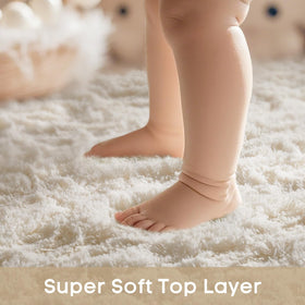 Ophanie soft shag-pile closeup highlights fluffy texture for barefoot-friendly comfort.