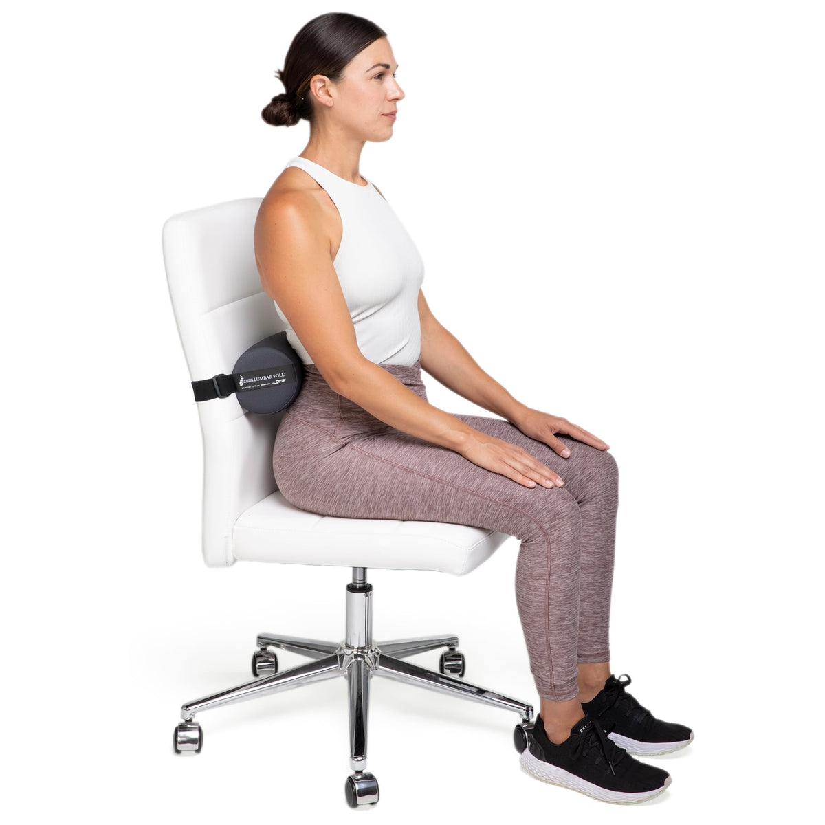 OPTP Lumbar Roll shown in an office chair demonstrating proper back support.