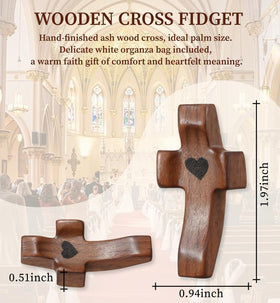 OrbitShell pocket cross held in hand showing compact devotion.