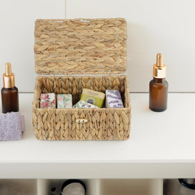 Ordelite lidded storage basket organized for pantry or shelves, dust-free contents.