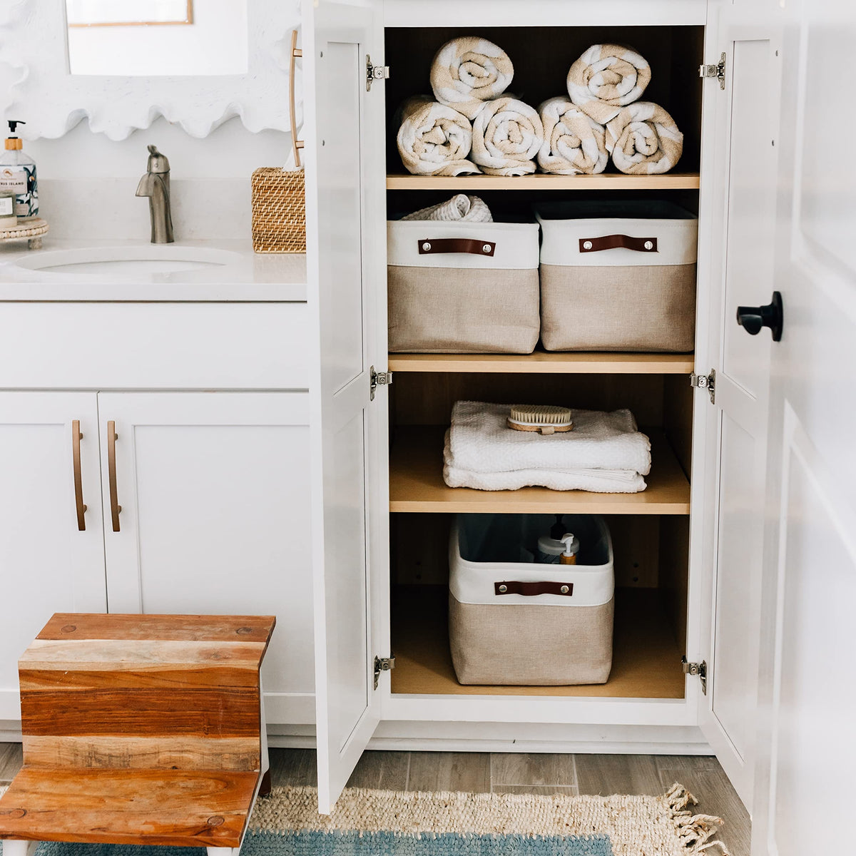 Beige/off-white fabric with vegan leather handles for easy lifting.
