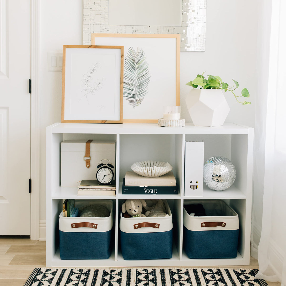 OrganiHaus navy and off-white fabric baskets coordinate across rooms