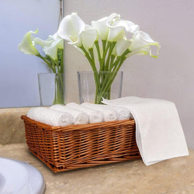 Orighty microfiber washcloths in hotel bathroom setup.