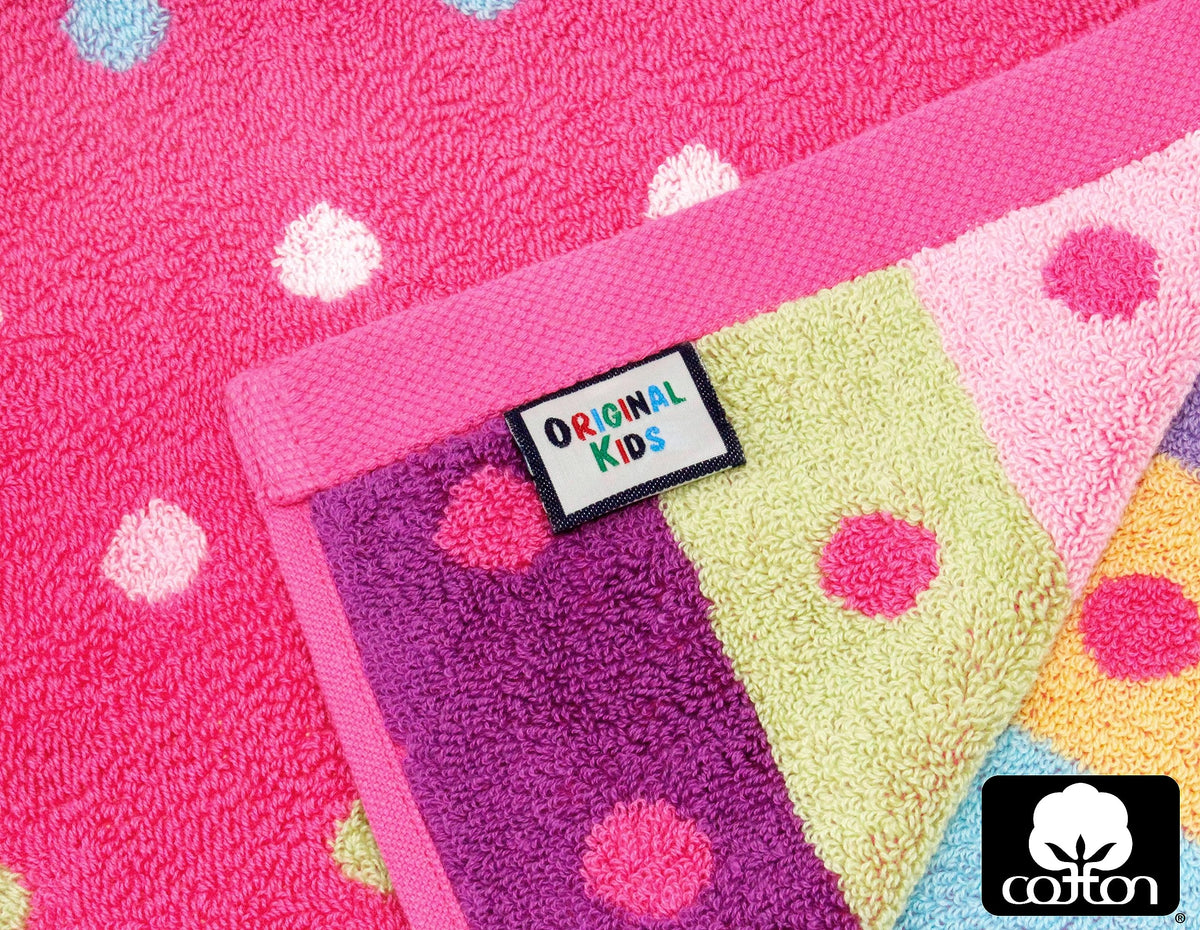 Close-up of playful pink dots and stripes on Original Kids cloths.