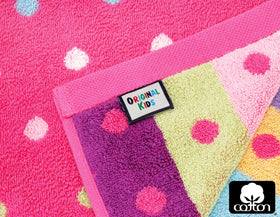 Close-up of playful pink dots and stripes on Original Kids cloths.