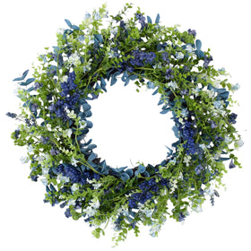 Orilium 24-inch wreath with blue berries enhances curb appeal at the front door.