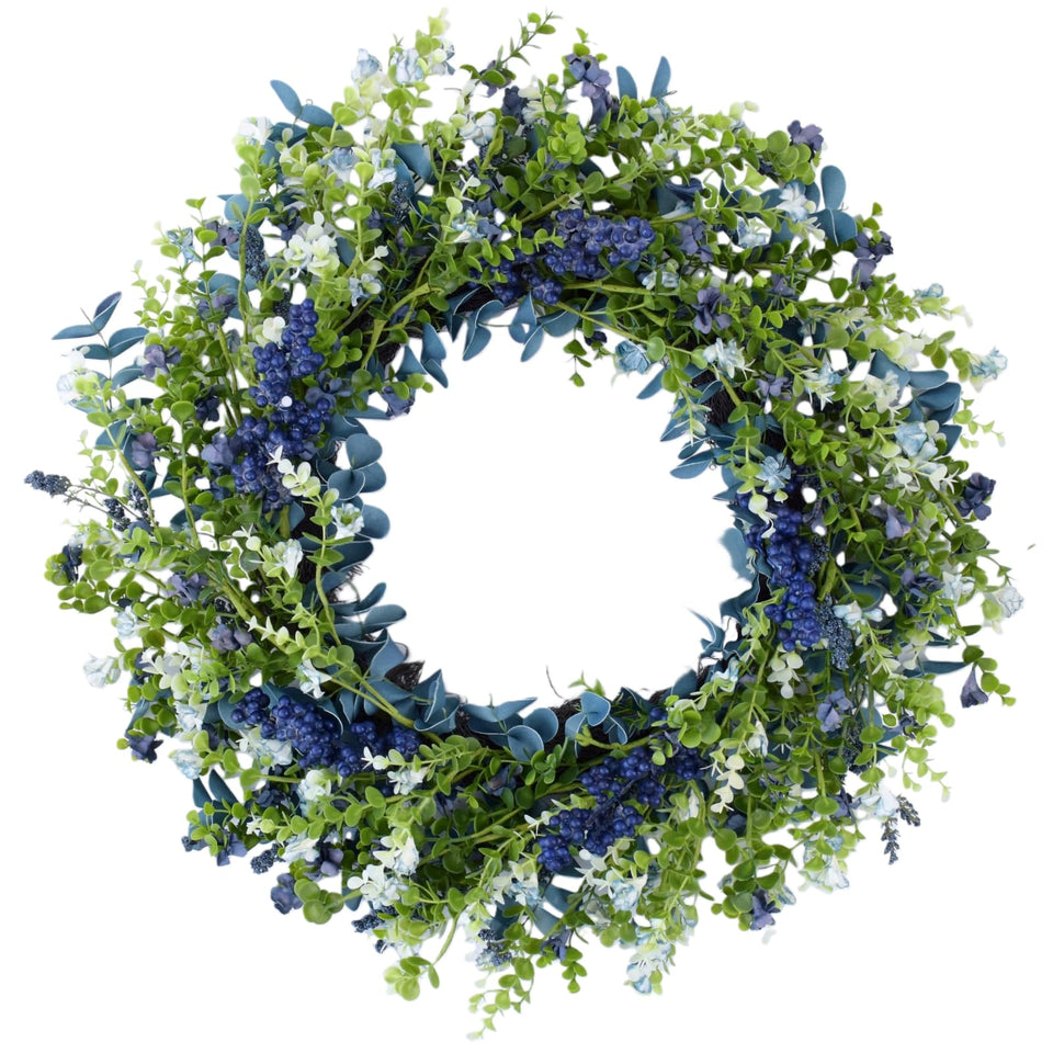 Orilium 24-inch wreath with blue berries enhances curb appeal at the front door.