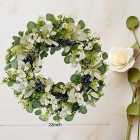 Orilium wreath with white and blue berries adds seasonal charm