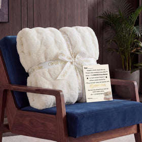 ORINOVA throw blanket draped over a sofa for cozy decor