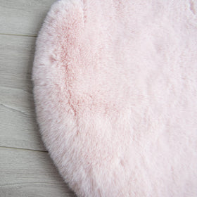 ORINOVA pink fuzzy rug in room creates inviting focal point