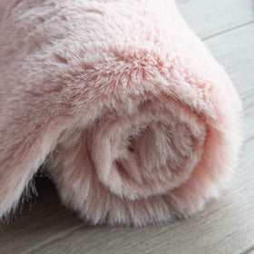 ORINOVA pink fuzzy rug edge details show durable stitching