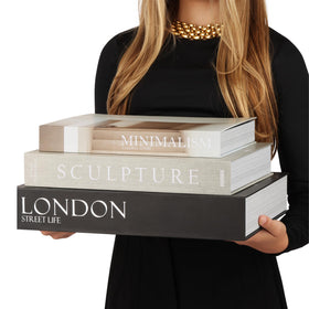 ORITZIO oversized decorative books with hidden storage for keys and remotes.