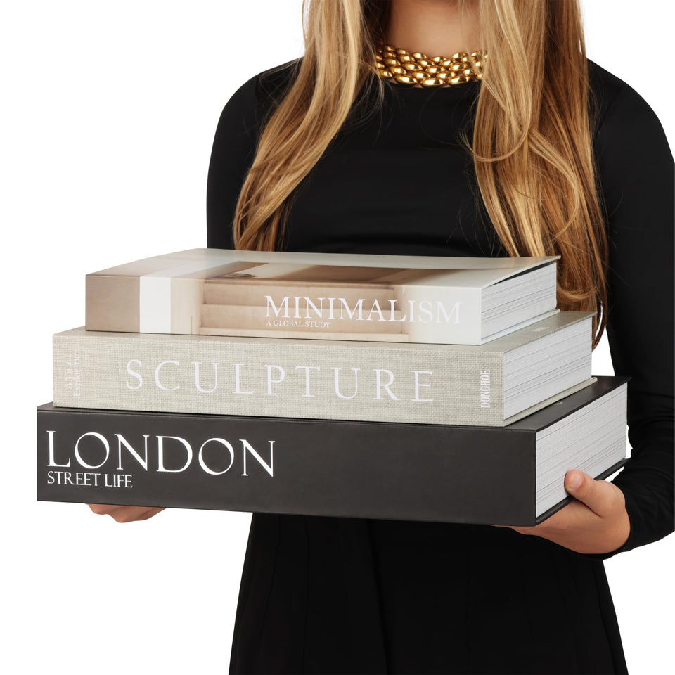 ORITZIO oversized decorative books with hidden storage for keys and remotes.
