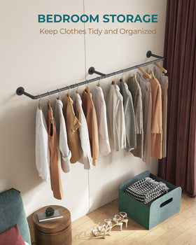 OROPY boutique display idea using rack for dresses and accessories.