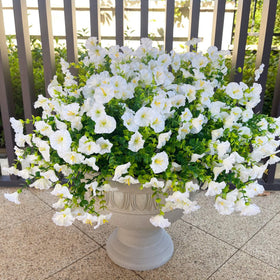 Orphidel outdoor artificial flowers in white with 16 bundles create lush planters.