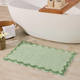 ORTIGIA cute green scalloped bath mat in soft microfiber, sized 20x32 inches.