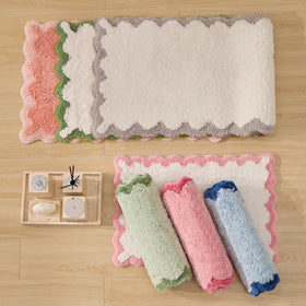 ORTIGIA lock-edge design reduces shedding for longer-lasting rug.