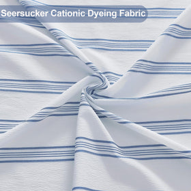 ORTIGIA seersucker fabric texture adds depth to the shower curtain.