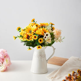 OTARTU multi-use pitcher vase suited for flowers or beverages.