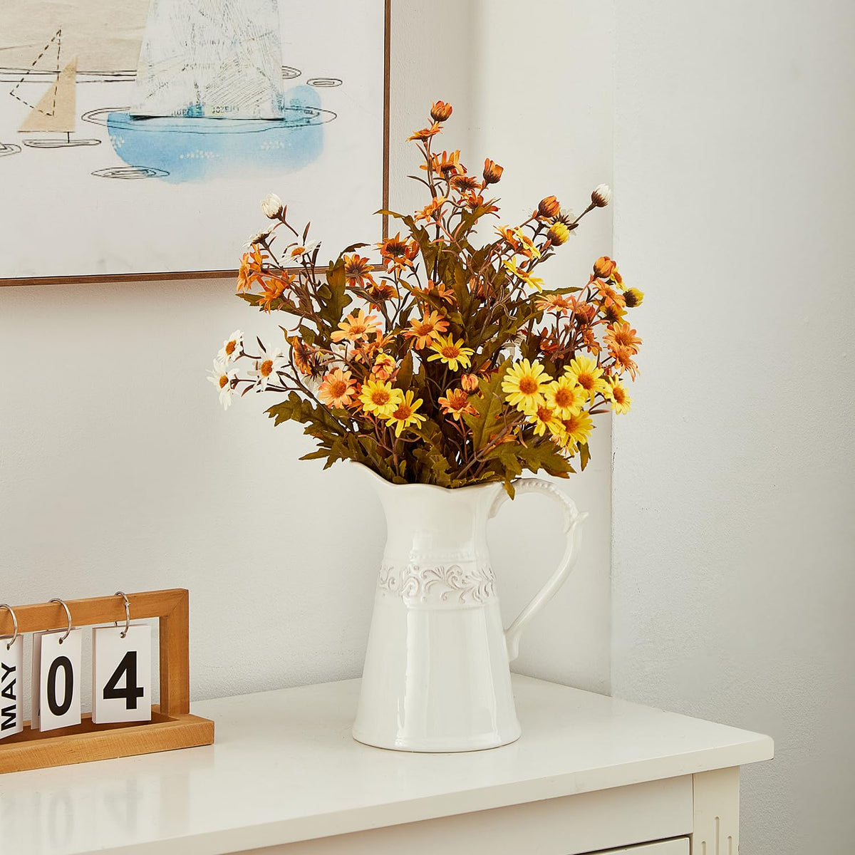 OTARTU white pitcher vase styled as a dining table centerpiece.