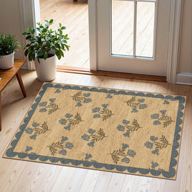 Othilic front door mat with floral scalloped edge enhances entryway decor.