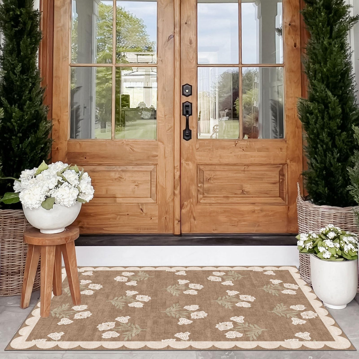 Othilic low-profile door mat fits under doors without obstruction.
