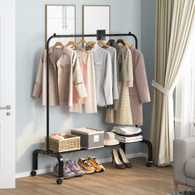 OTROUWORHT clothes rack bottom shelf supports shoes or boxes.