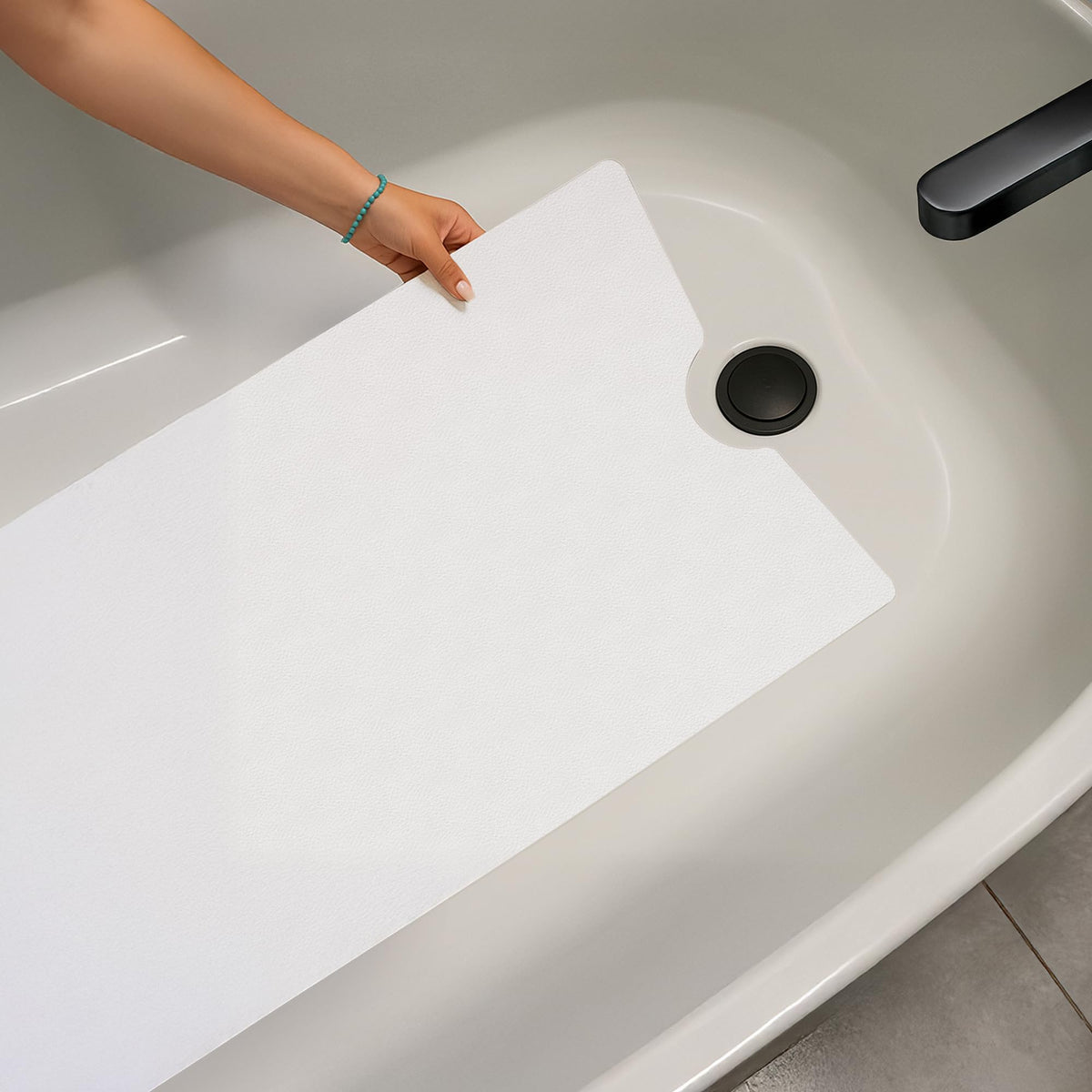 OTTC Safety Solutions bath mat shows drain cut-out for proper water flow