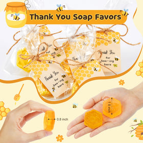 Otuuz baby shower favors pack neatly displayed on a table.