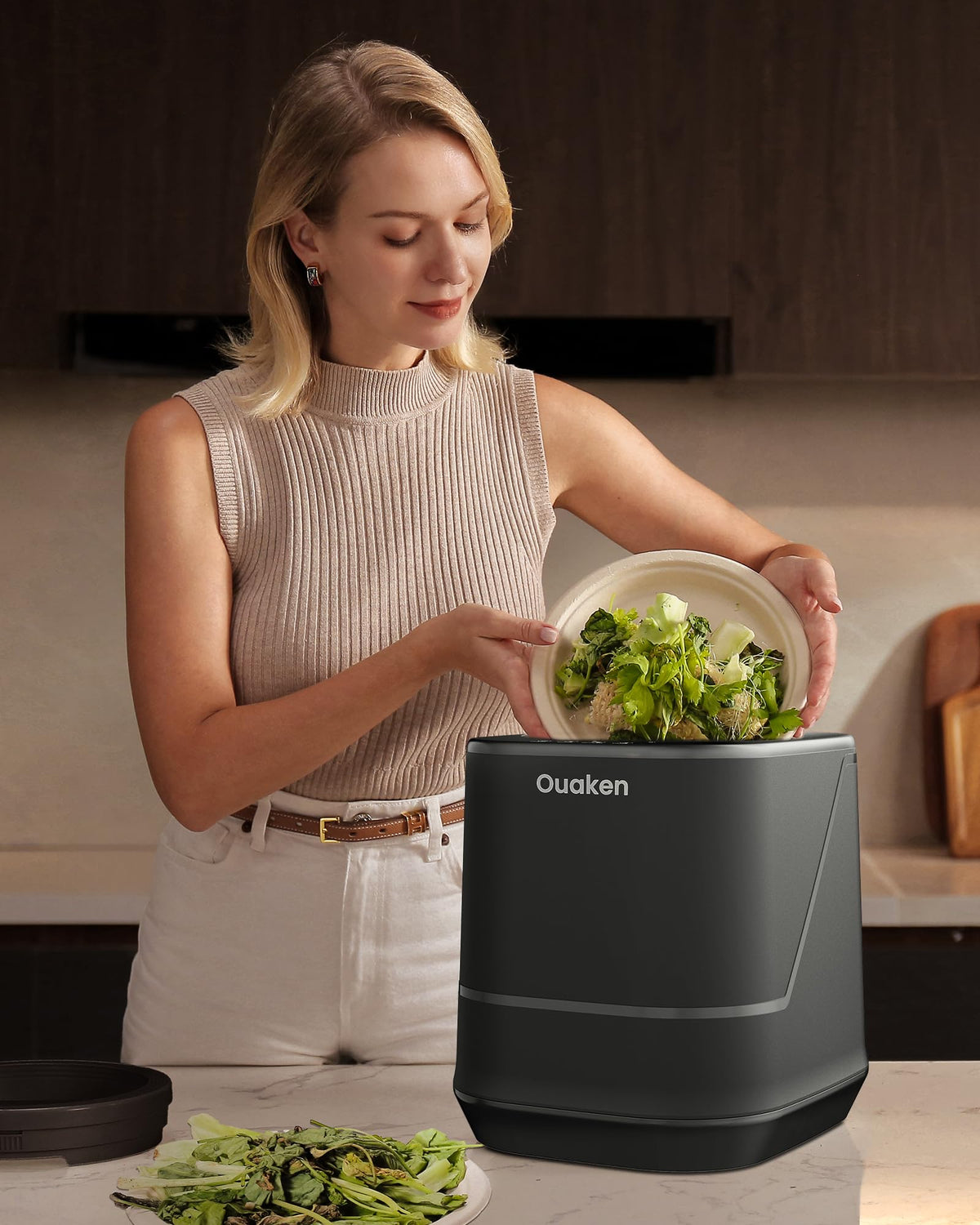 Ouaken odor-control system highlights effective odor elimination during kitchen composting.