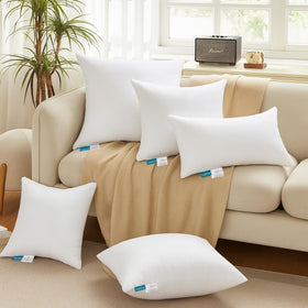 Oubonun 22x22 pillow inserts after unpacking, flat at first, ready to fluff.