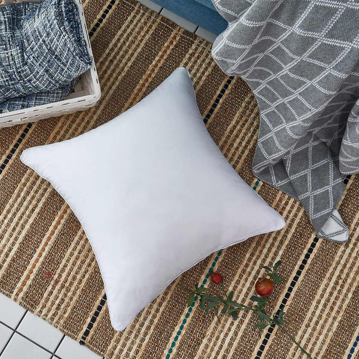 Oubonun white pillows on loveseat illustrate versatile decor for various rooms.