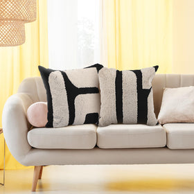 Oudain tufted pillow detail reveals geometric pattern for visual interest