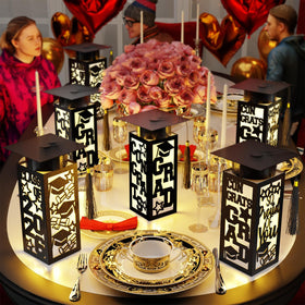 OuMuaMua six lanterns lit with a warm glow for Class of 2026 celebrations.