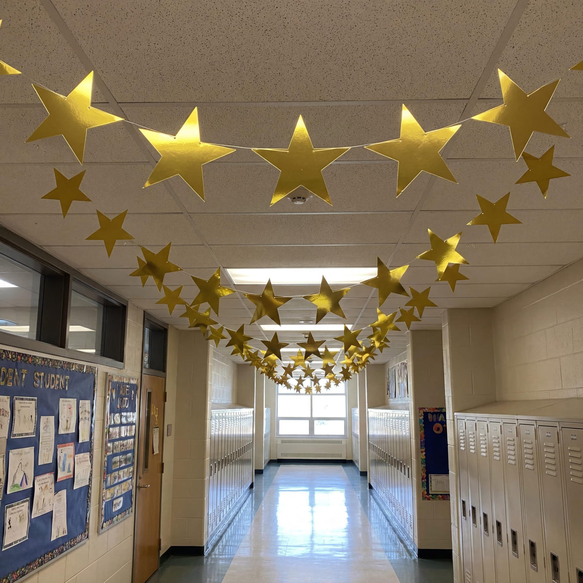 Outus gold star cutouts used as table decor and wall accents.
