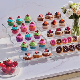 OVNTHYK acrylic risers save cabinet space with compact platforms.