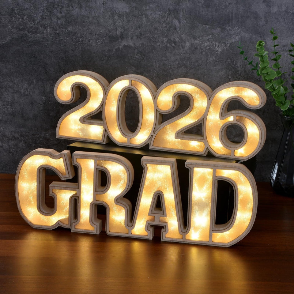 Ovootok Grad light-up letters glow warmly for graduation celebrations