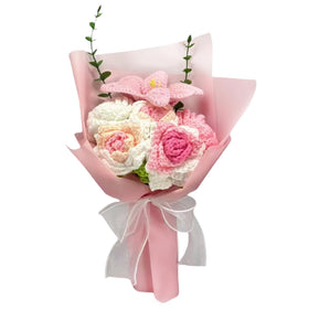 OVRRCSME crochet flower bouquet in big pink serves as an elegant home centerpiece.