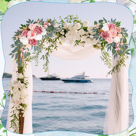 Ovveroche floral garland backdrop enhances ceremony photo area.