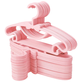 Ovveroche pink baby hangers in a compact nursery closet keeping tiny outfits neatly organized