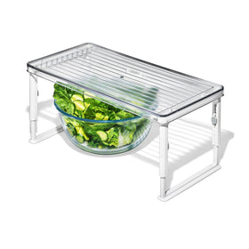 OXO Good Grips Adjustable Fridge Shelf Riser, front view, maximizing vertical space for easy access.