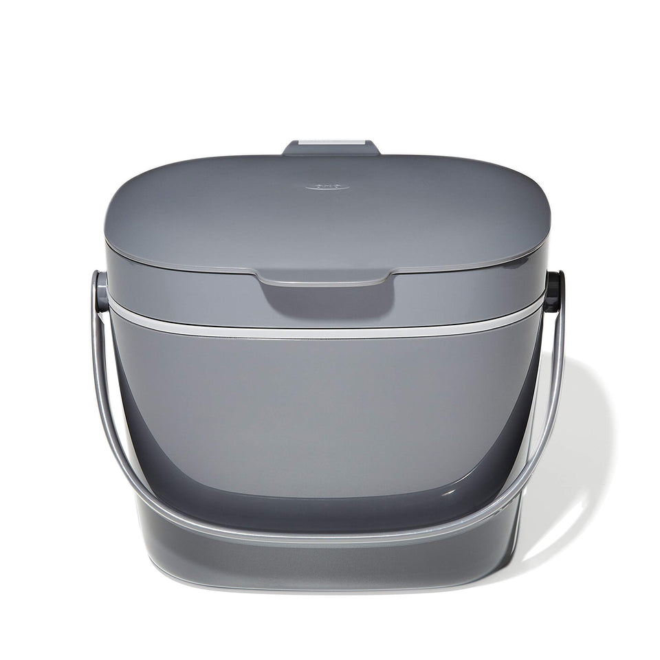 OXO Good Grips compost bin with lid open for easy scraps tossing