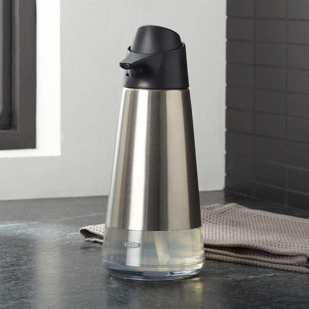 OXO Good Grips dispenser on a counter with a modern kitchen aesthetic